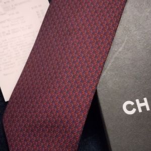 - Authentic Chanel tie ( with receip and no box )